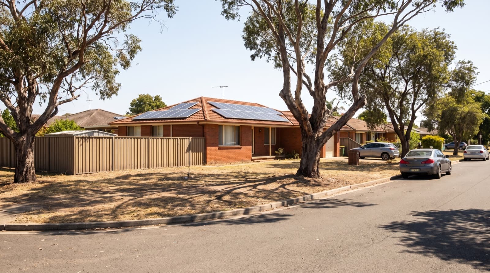 Brick family home with rooftop solar on a hot summer afternoon in Blacktown, western Sydney