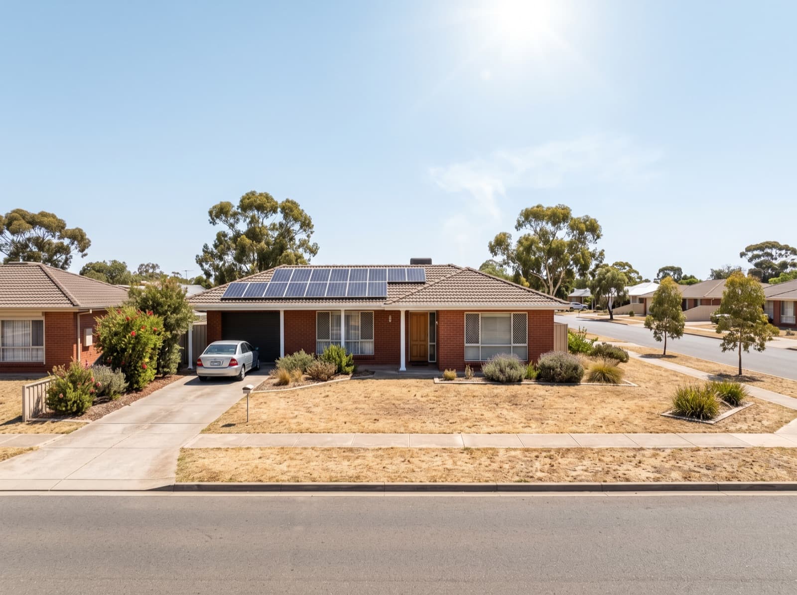 Single-storey brick home with a large rooftop solar array on the northern Adelaide plains